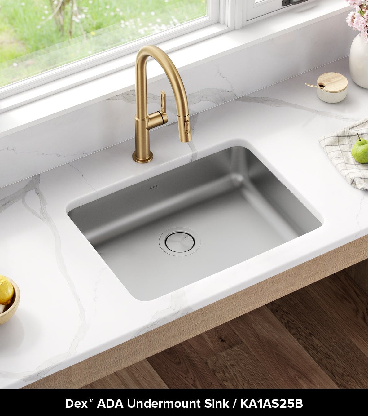 Kraus ADA compliant Dex undermount sink in white kitchen counter with gold pull down faucet